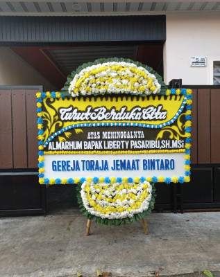 Papan Bunga Duka di Padang Serai